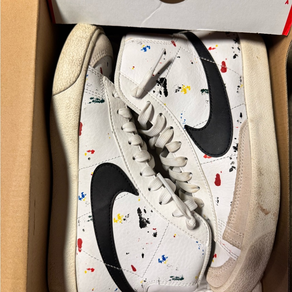 Nike White Sneakers with Black Swoosh and Colorful Splatter